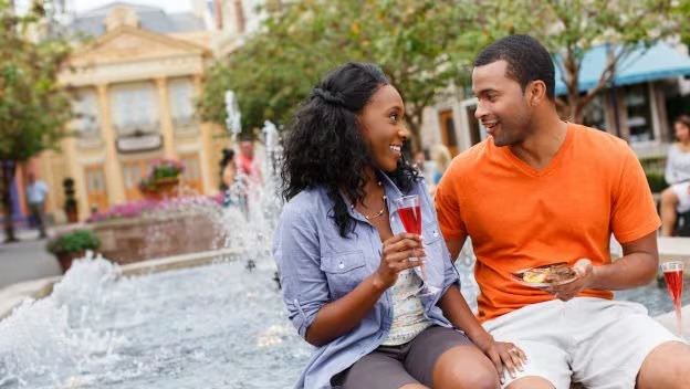 Guests enjoy food and drinks at France in EPCOT