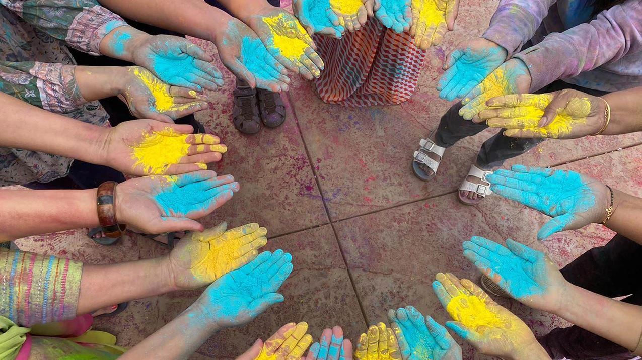 Disney Cast Members Spread Love and Color by Celebrating Holi