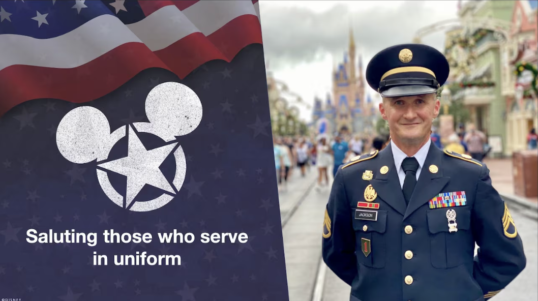 Military man smiling standing in Magic Kingdom