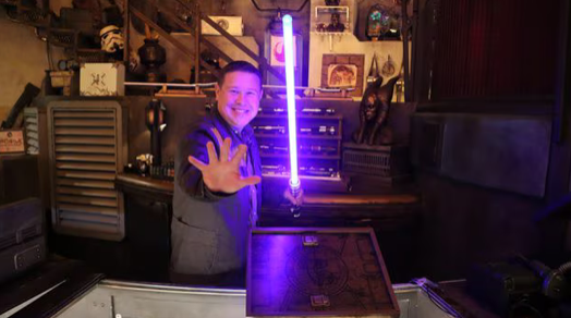 Disney Cast Member with New Legacy LIGHTSABER Hilt