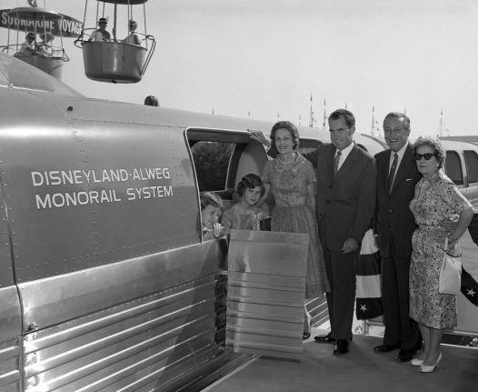 Vice President Richard Nixon at Disneyland with family to celebrate the grand opening of the Disneyland-Alweg Monorail System