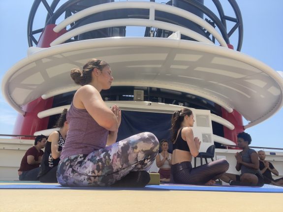Disney Cast doing yoga, Disney Cruise Line