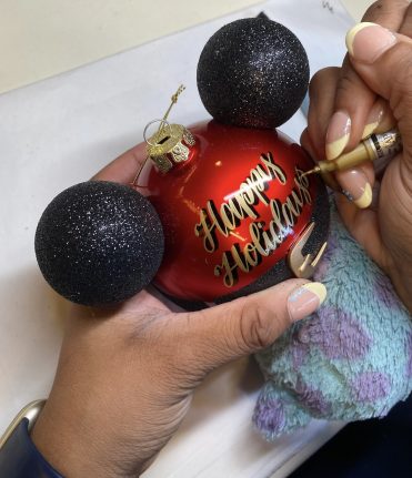 Ornament personalization at Ye Olde Christmas Shoppe at Magic Kingdom