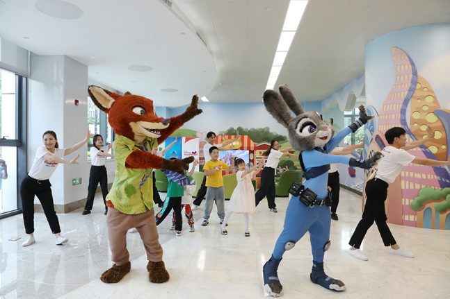 Nick Wilde and Judy Hopps play at a Disney Fun House