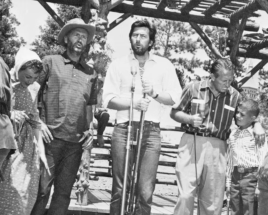 Television host Art Linkletter, and “Davy Crockett” stars Fess Parker and Buddy Ebsen, shown here in Frontierland before the broadcast