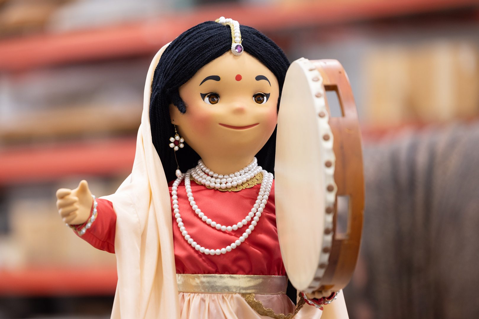 An “it’s a small world” doll after refurbishments at Disney World Central Shops