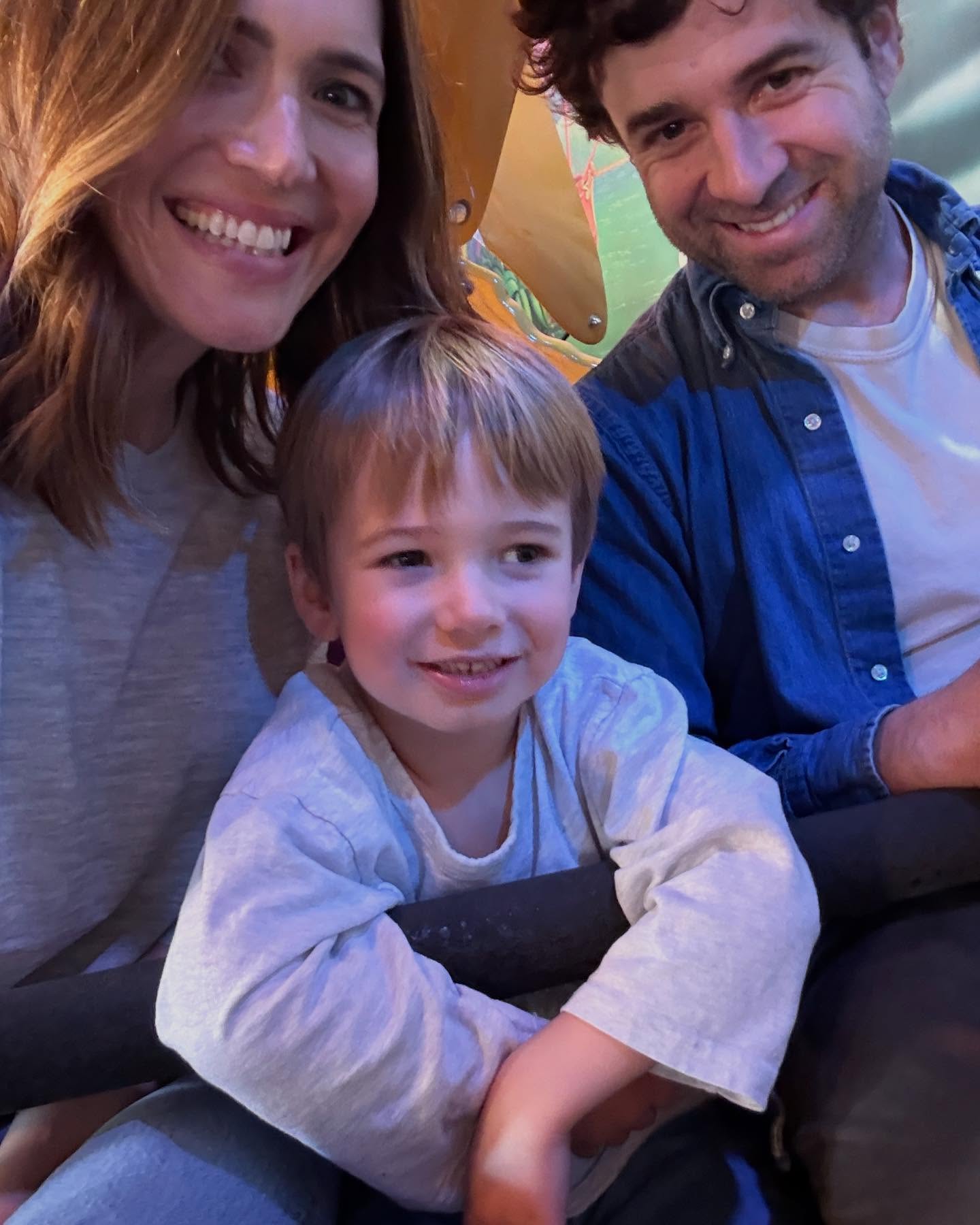 Mandy Moore and family on a Disney attraction.