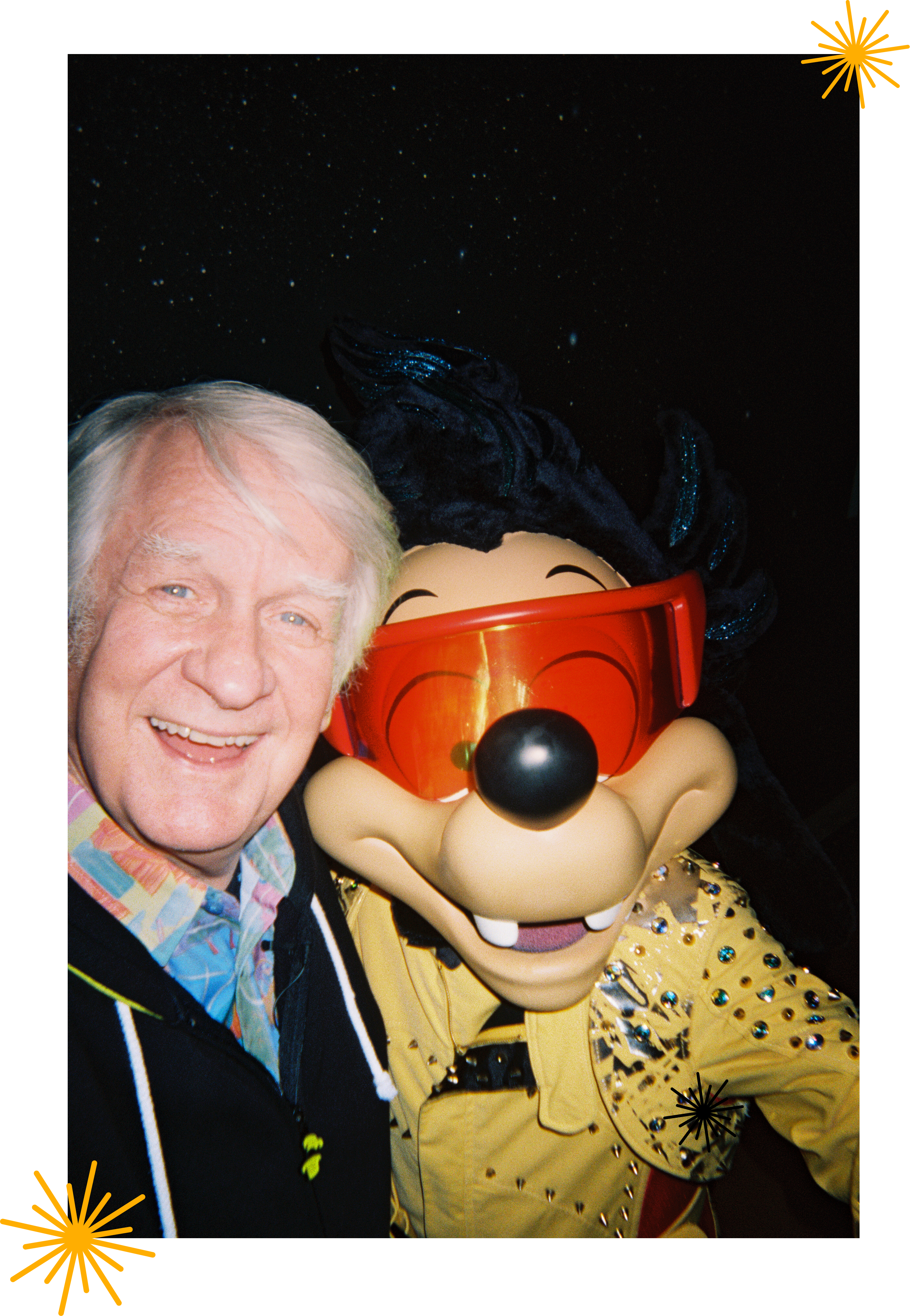 Bill Farmer and Disney's Powerline Max posing for a selfie.