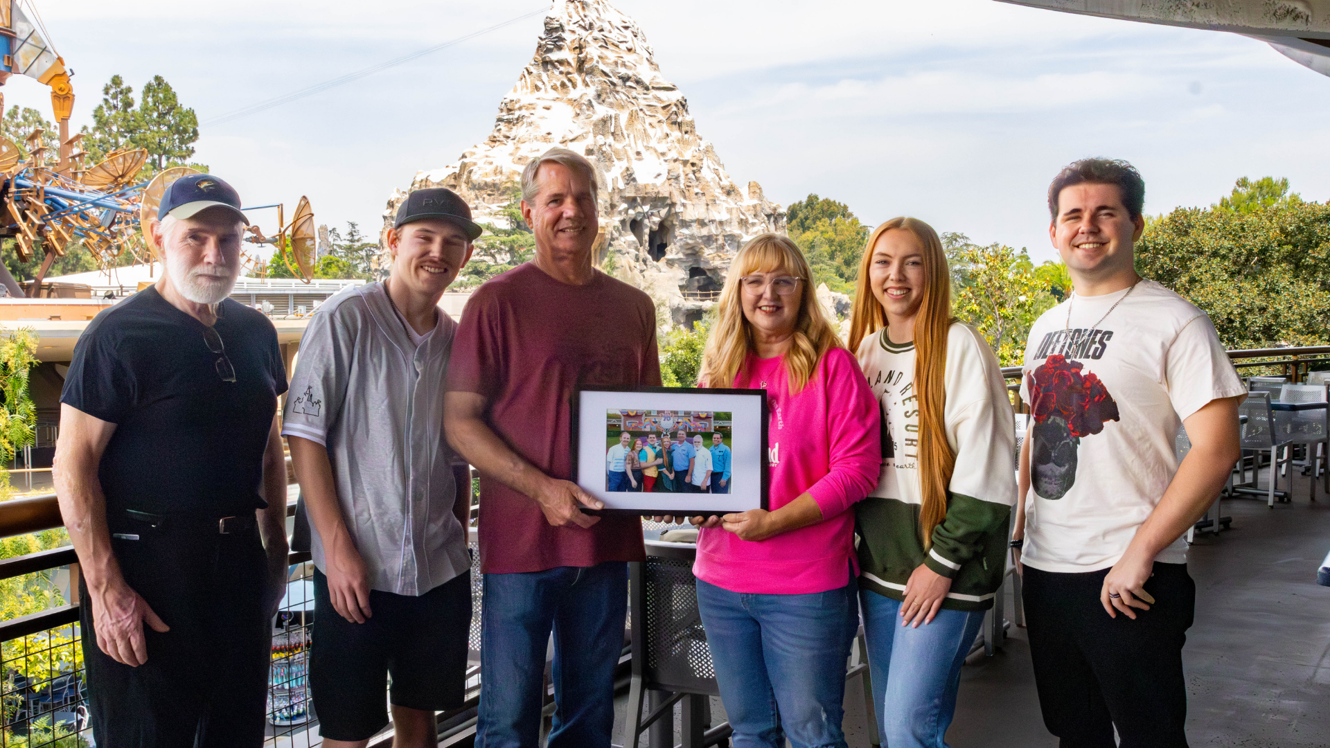 Disneyland Cast Member Suprises Mom with the Ultimate Family Photo