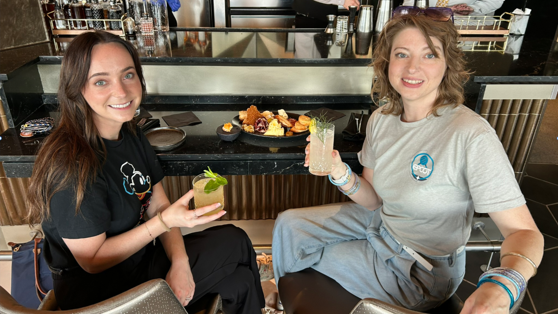 Laura and Rain enjoy sips and bites at the GEO-82 bar