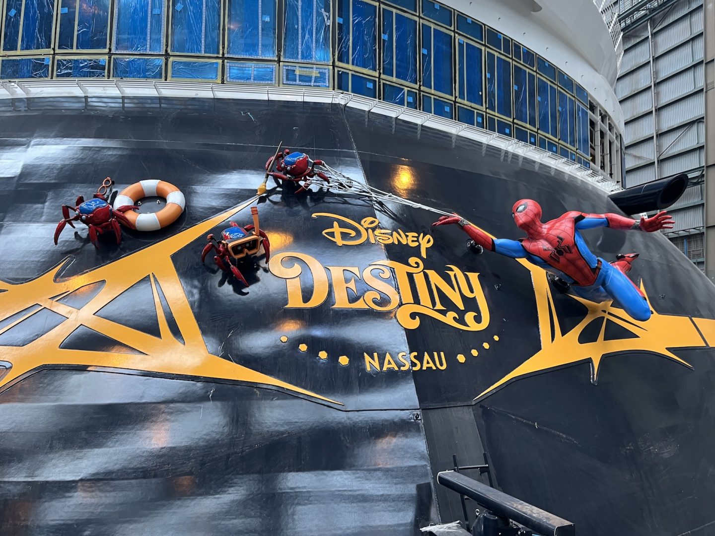 Spider-Man and Spider Bots adorn the stern of the Disney Destiny