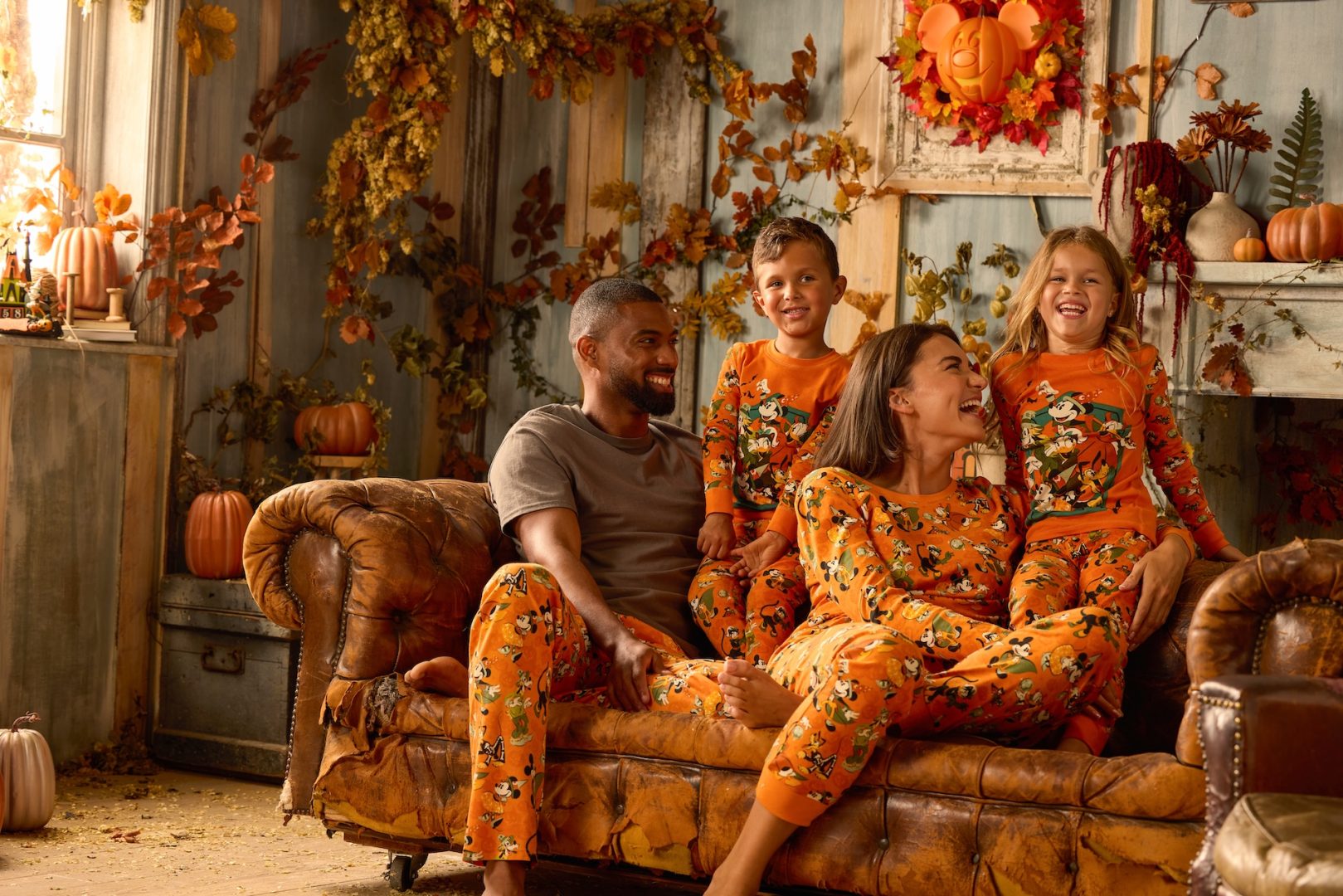 Family wearing Mickey Mouse and Friends Halloween Pajama Pals sets 