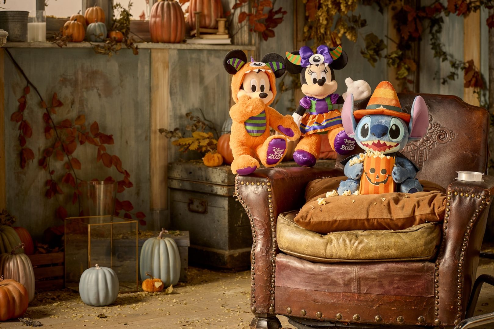 Mickey Mouse Family Halloween plushes on a chair