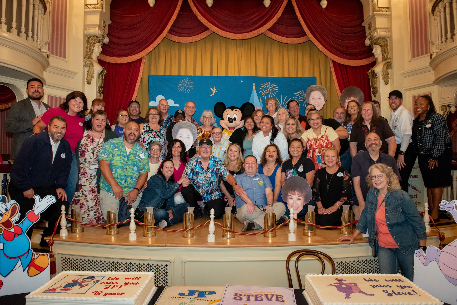 Cast member group photo with Steve and JP during their retirement celebration