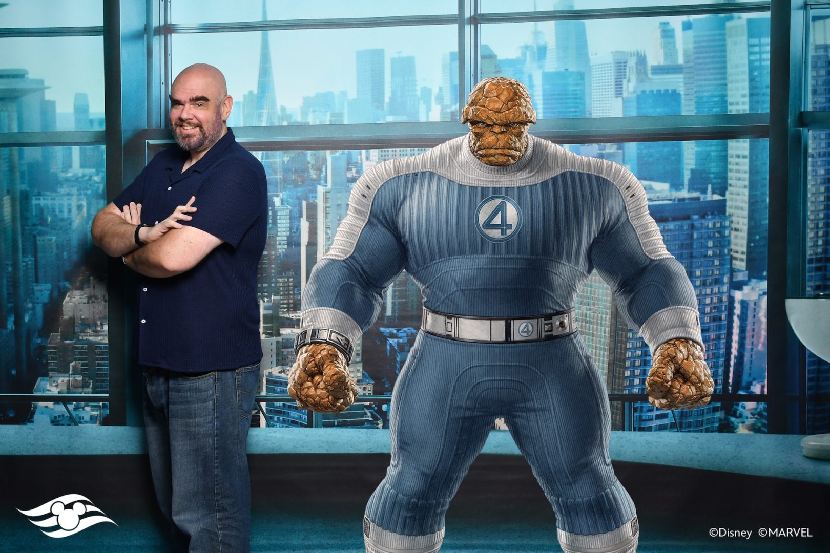 Man posing for DCL Magic Shot with The Thing