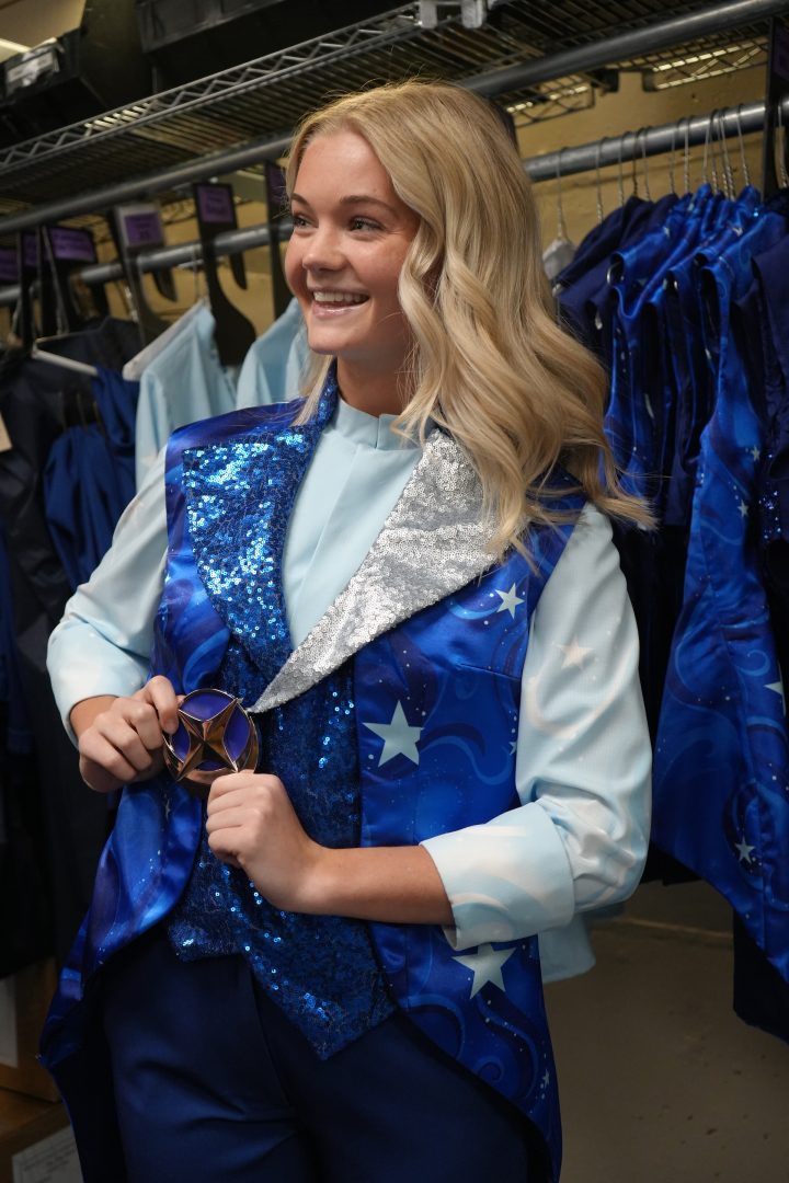 Saige, Performer trying on Disney Starlight costumes backstage