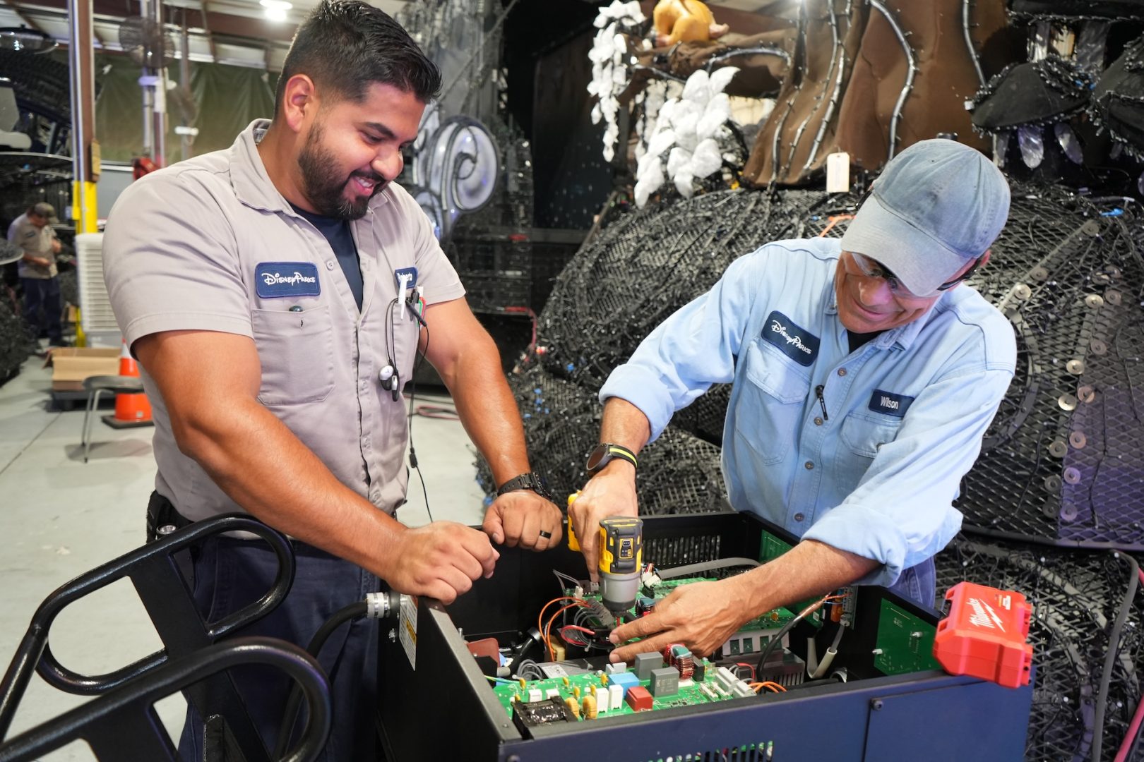 Roberto, Computer Ride Show Technician and Wilson, Mechanic preparing Disney Starlight floats