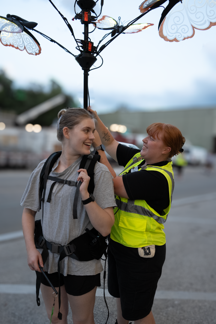 Elizabeth, Performer and Julia, Entertainment Technician rehearsing outside for Disney Starlight