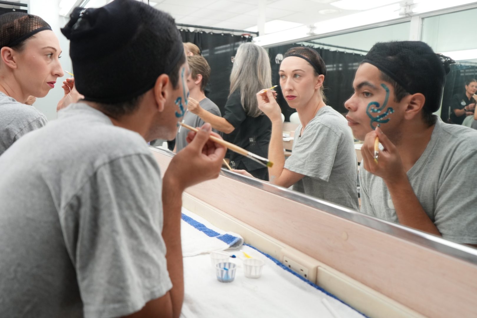 Falan & Danny, Performers doing Disney Starlight makeup in the dressing room
