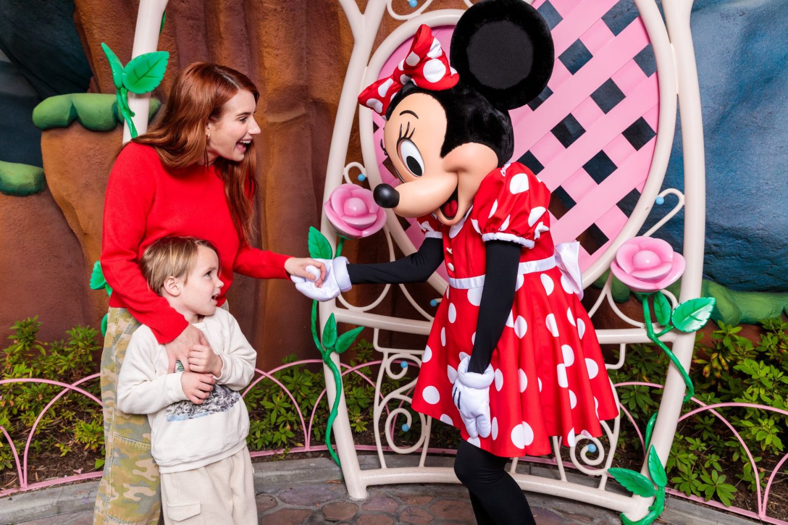 Emma Roberts at Disneyland Park with Minnie Mouse