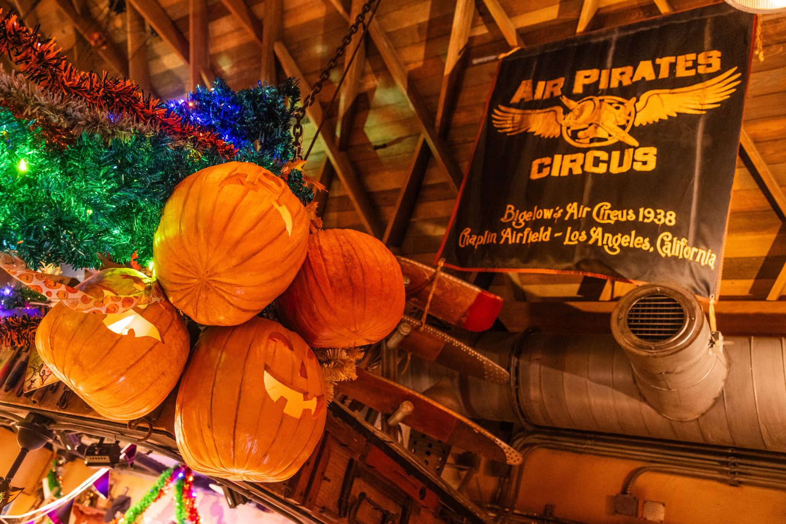 Halloween Hangar Bar Decor Pumpkin Heads and Garland