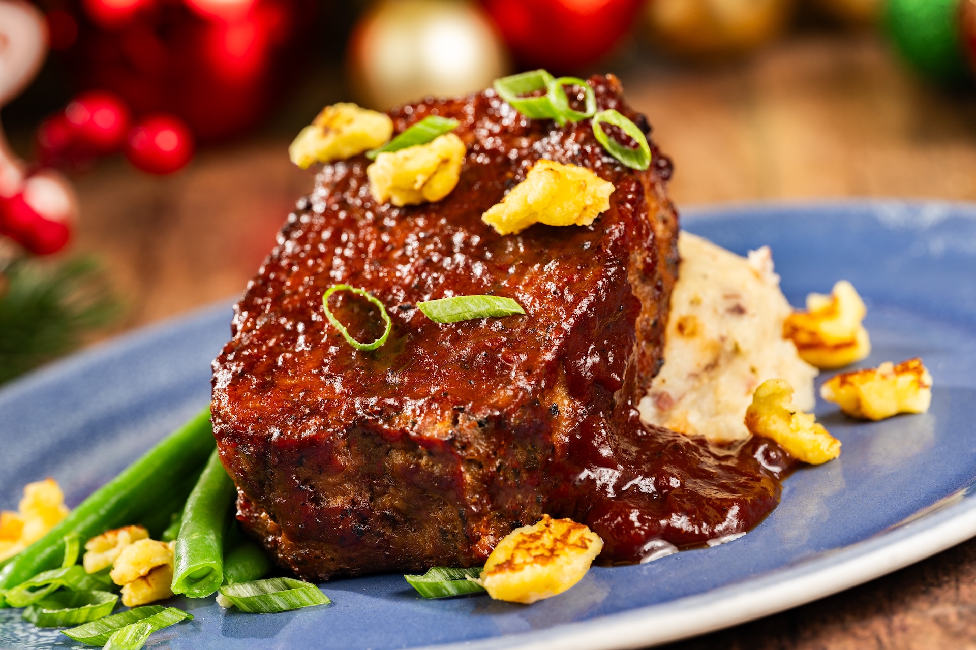 Holiday Turkey Meatloaf with mashed potatoes, green beans, cornbread crumbles, and cranberry barbecue sauce (New) 