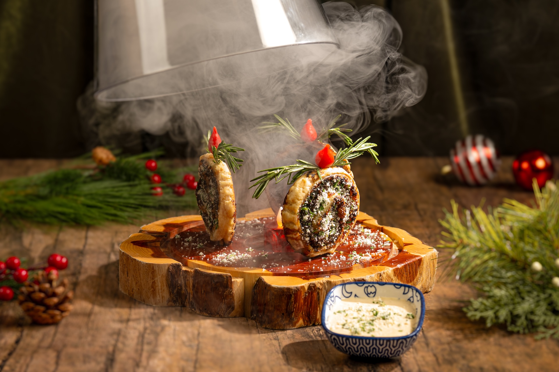 A Wreath of Wellington: Strip steak, mushroom duxelles, Gruyère, puff pastry, herbed parmesan, and horseradish-mustard aïoli (New) 