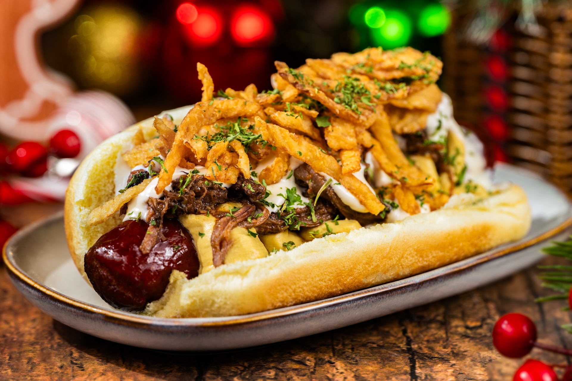 Holiday Pot Roast Hot Dog: All-beef hot dog topped with pot roast, beer-cheese sauce, crispy onions, and horseradish mustard