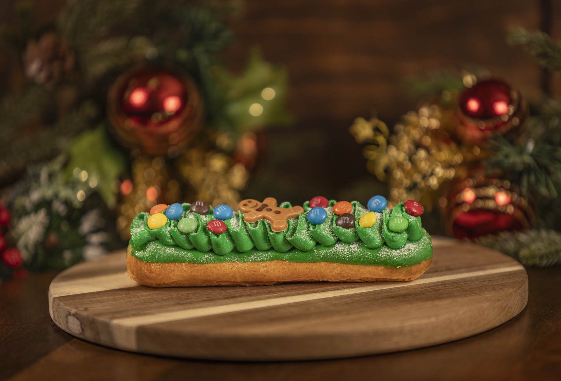 Holiday M&M'S Éclair filled with milk chocolate mousse and topped with whipped ganache and M&M’S Milk Chocolate Minis (New)