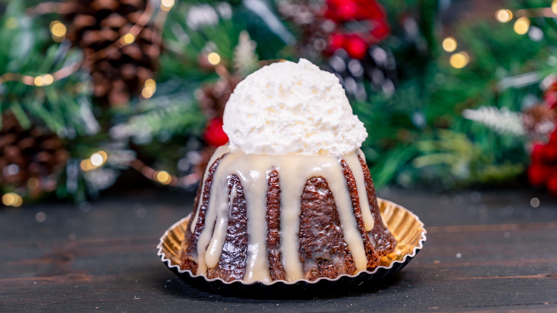 Sticky Toffee Bundt Cake with toffee sauce topped with vanilla chantilly cream 