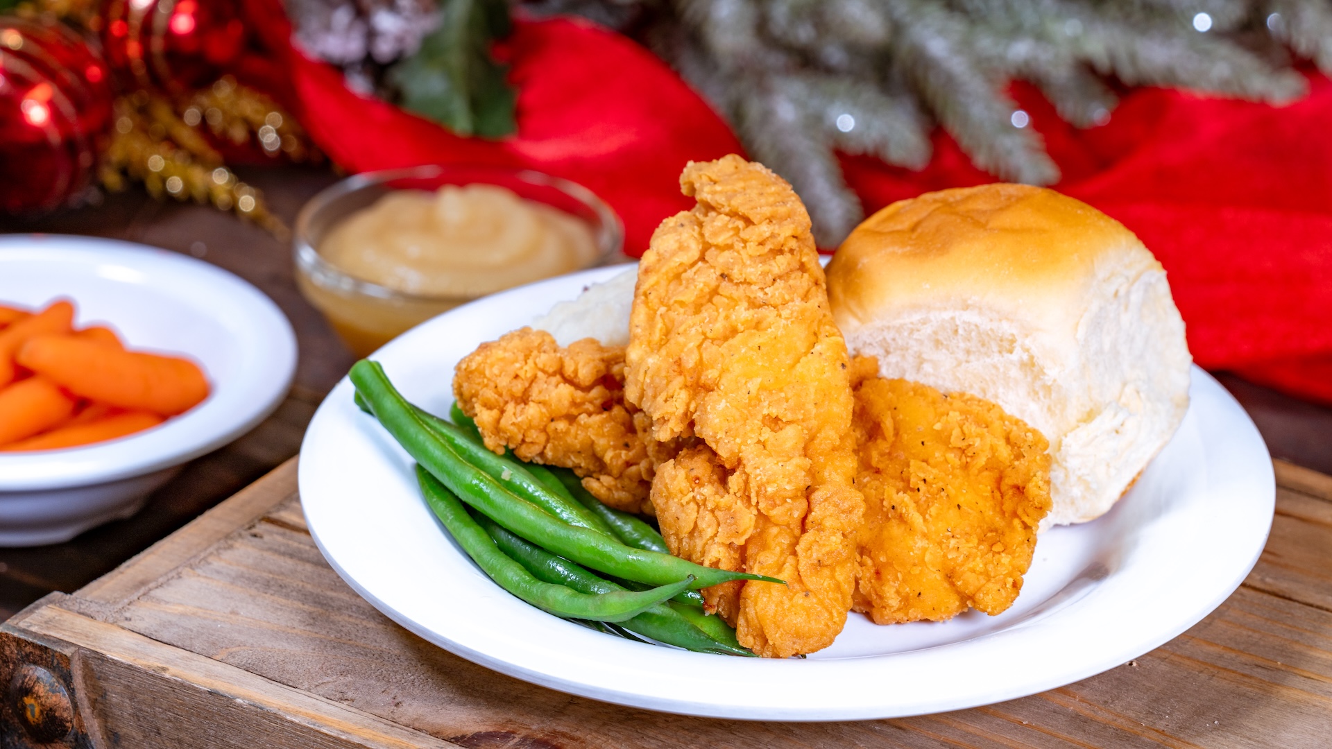  Child Menu: Child holiday meal offering a chicken tender, creamy mashed potatoes, green beans, chicken gravy with a Hawaiian roll, holiday Yule log dessert, and choice of small Dasani bottled water or low-fat milk  