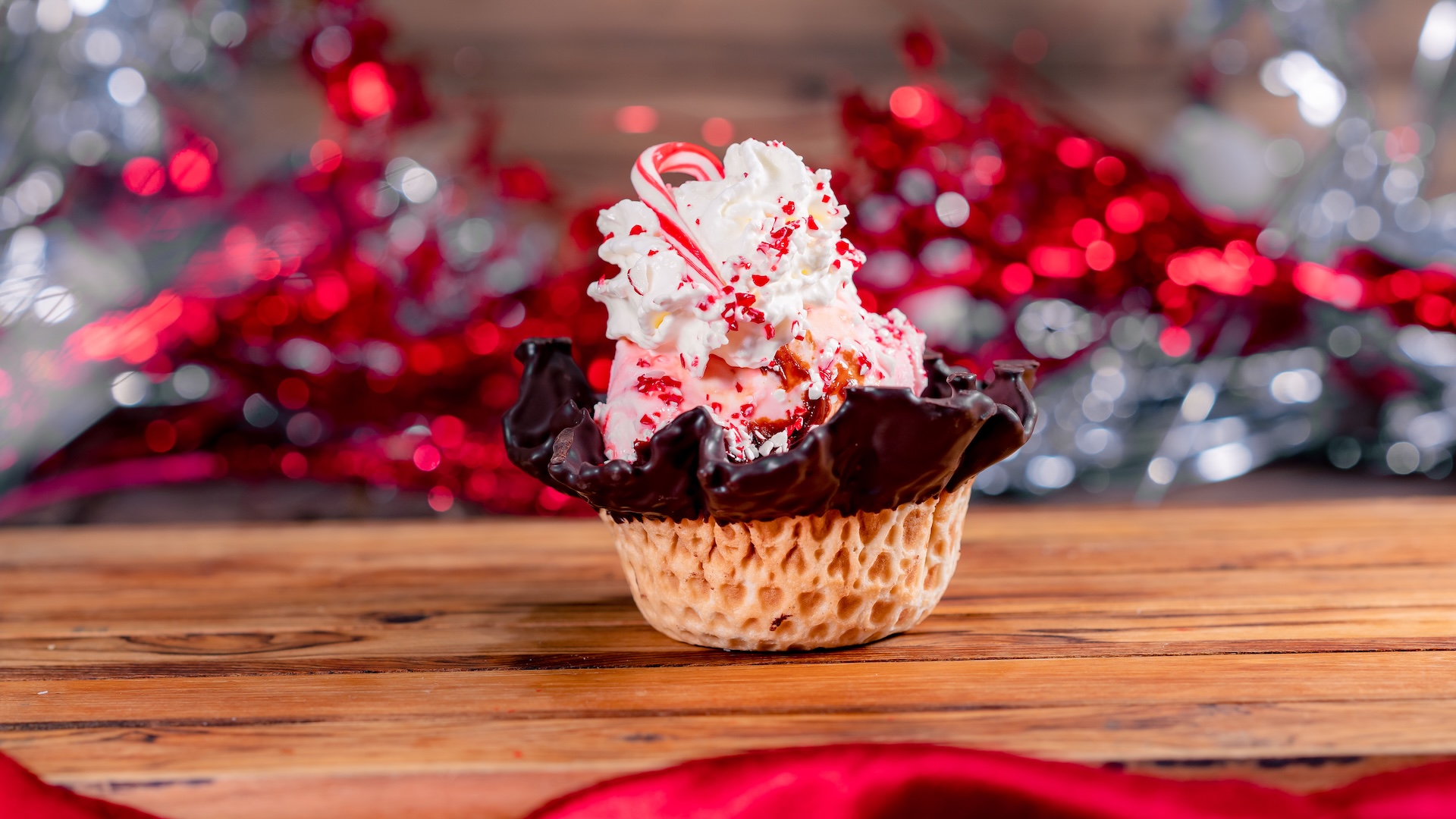 Chocolate-Peppermint Sundae: Chocolate and peppermint ice cream in a waffle cup, topped with whipped cream and peppermint candy 