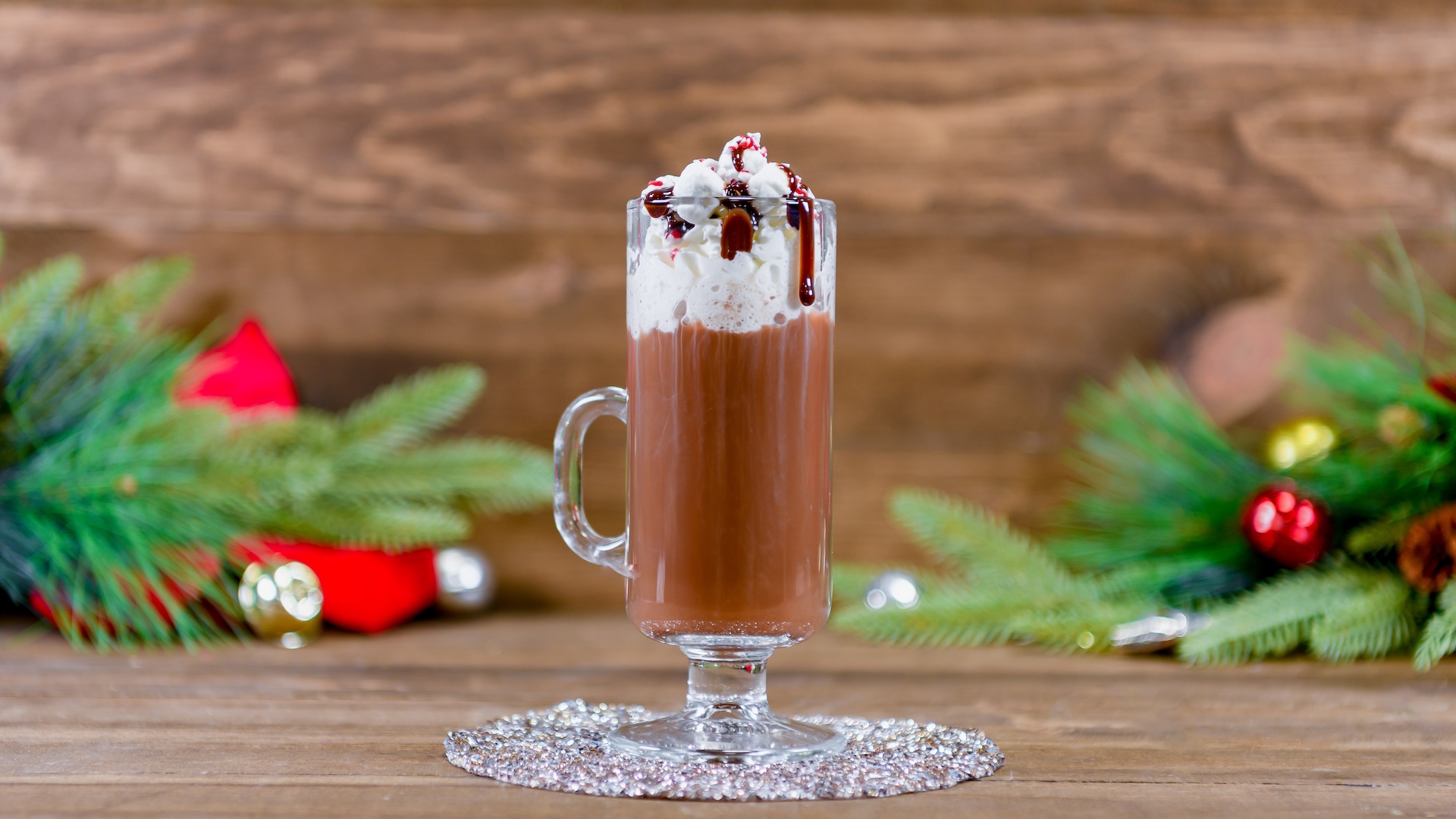 Peppermint S’mores Hot Chocolate: Hot Cocoa by Joffrey’s and peppermint syrup, topped with whipped cream, mini marshmallows, graham cracker dust, and crushed candy cane (Non-alcoholic) 