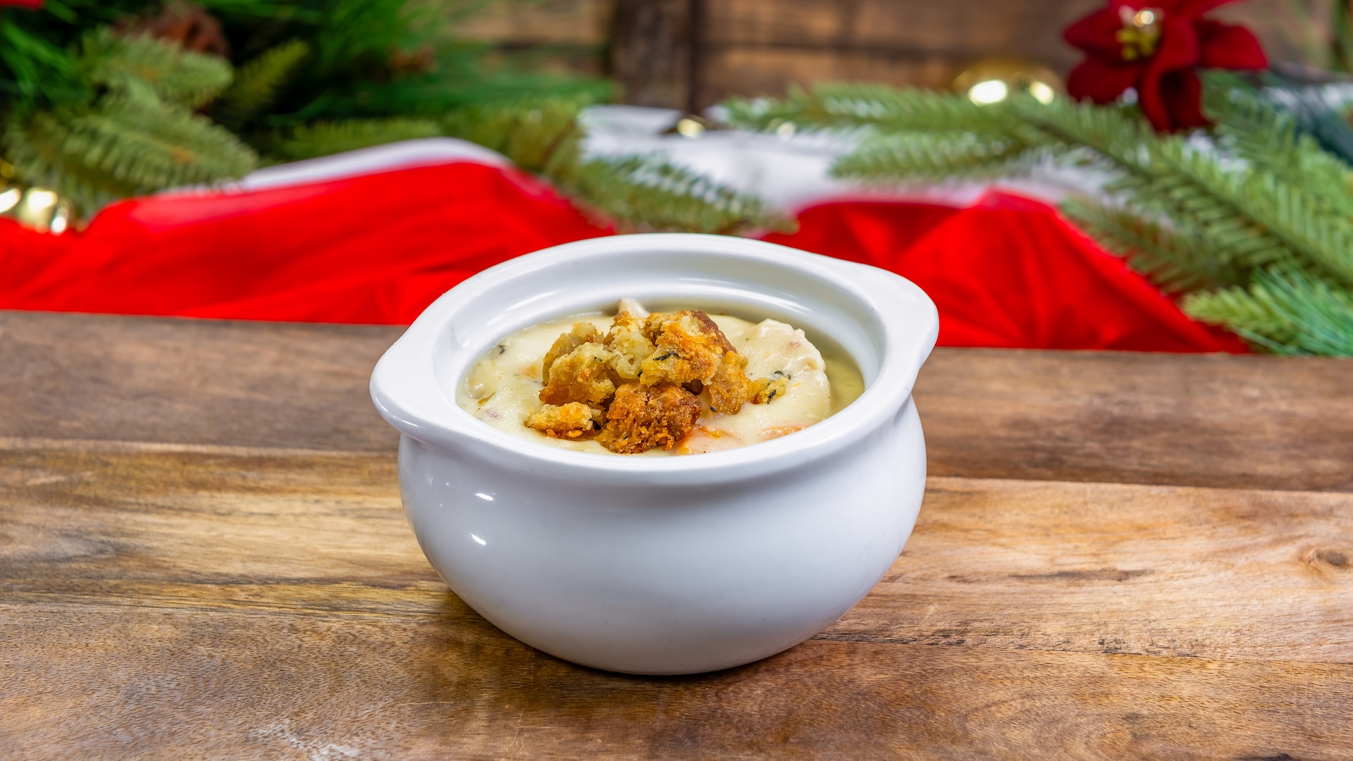Turkey Pot Pie Soup: Tender turkey breast, potatoes, peas, and carrots topped with pie crust pieces 