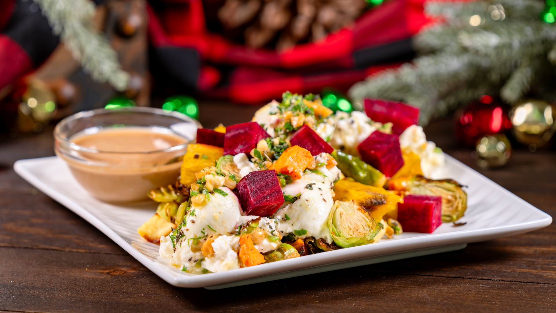 Roasted Vegetable Salad: Roasted Brussels sprouts, beets, butternut squash, yams, and burrata cheese with herbed balsamic vinaigrette 