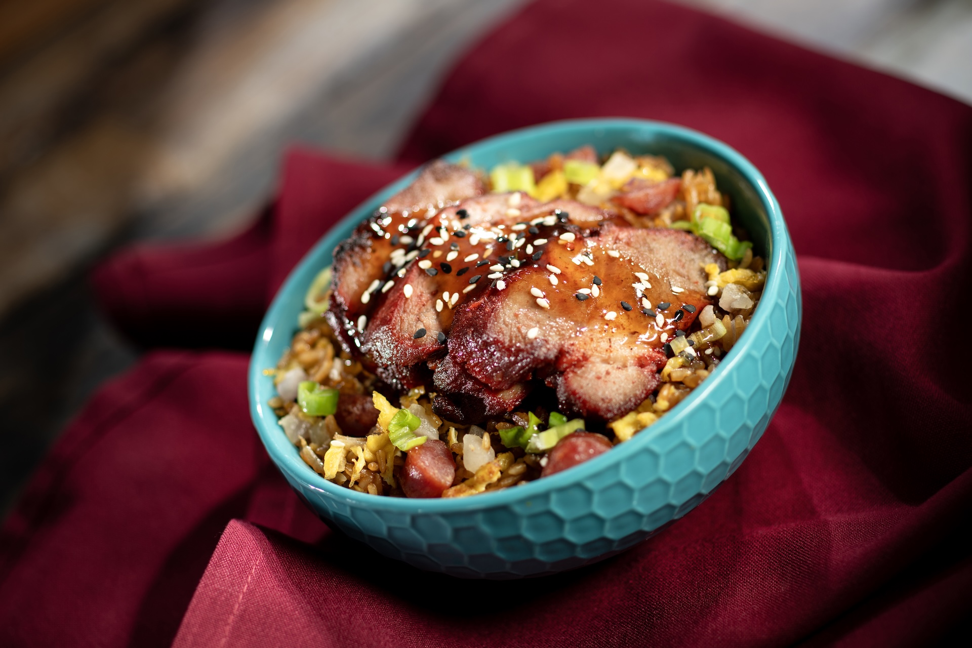 BBQ Char Siu Pork Fried Rice with Chinese La Chang sausage, egg, yellow onion, green onion, and sesame (New)