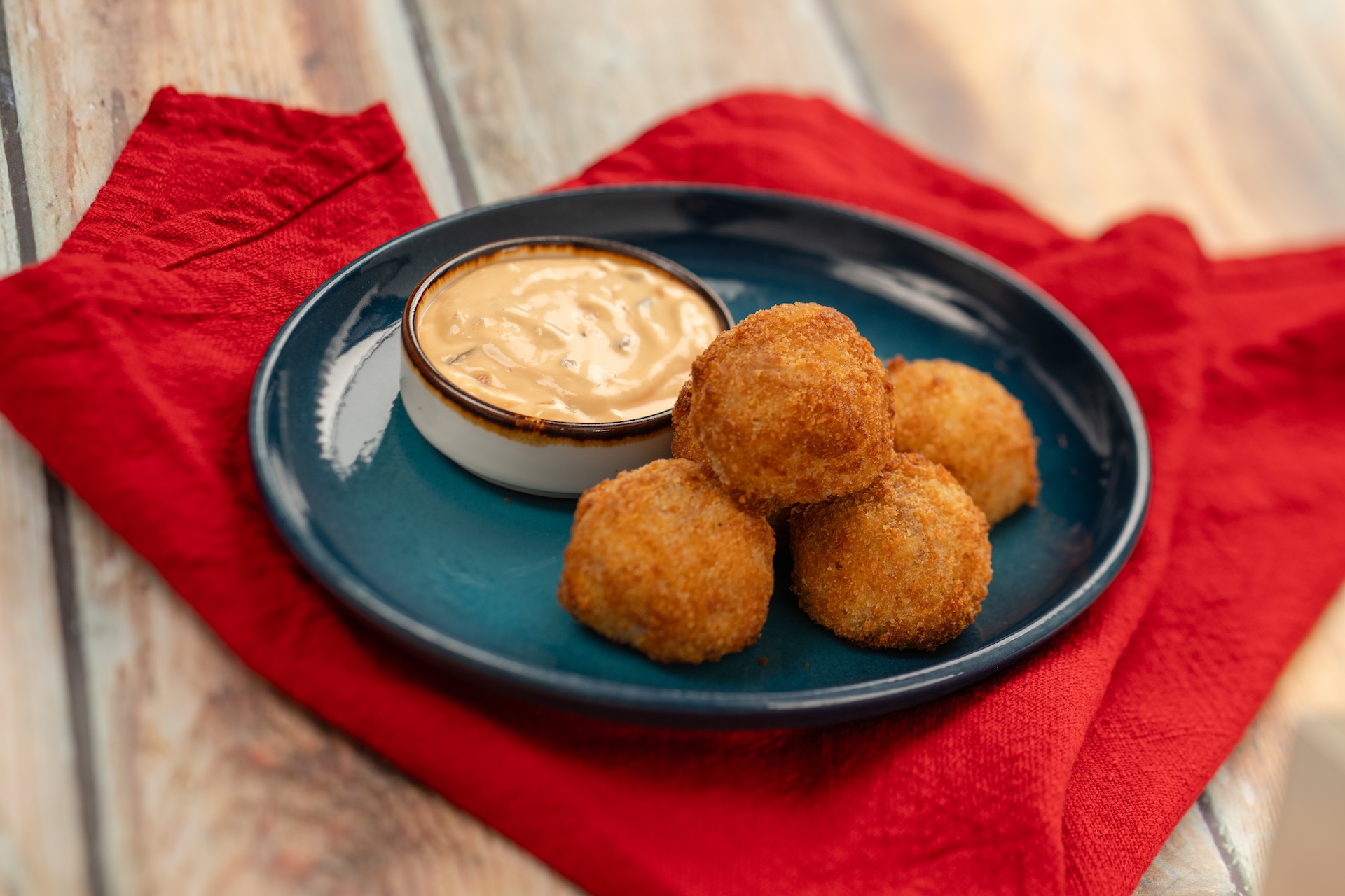 Reuben Croquettes with pastrami, sauerkraut, and Swiss cheese with Thousand Island dipping sauce