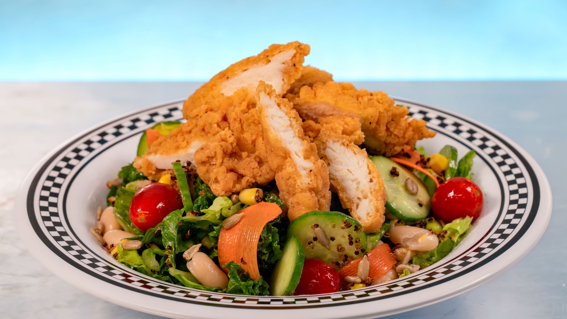 Fillmore Groovy Greens with Crispy Chicken Fenders at Flo's V8 Cafe