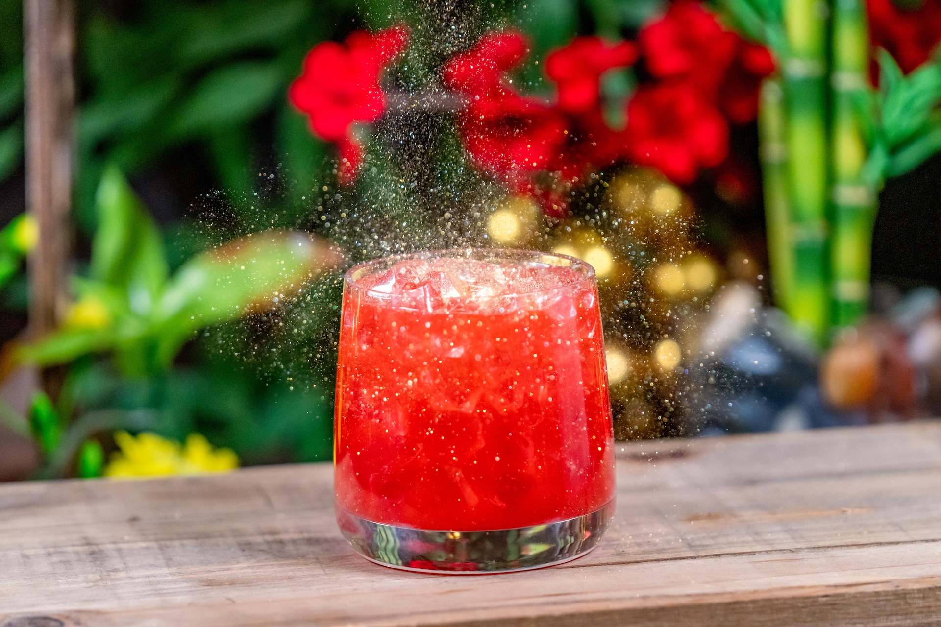 Red Envelope Margarita: Tequila, orange juice, sweet and sour, raspberry purée, blood orange syrup, and gold shimmer (New)