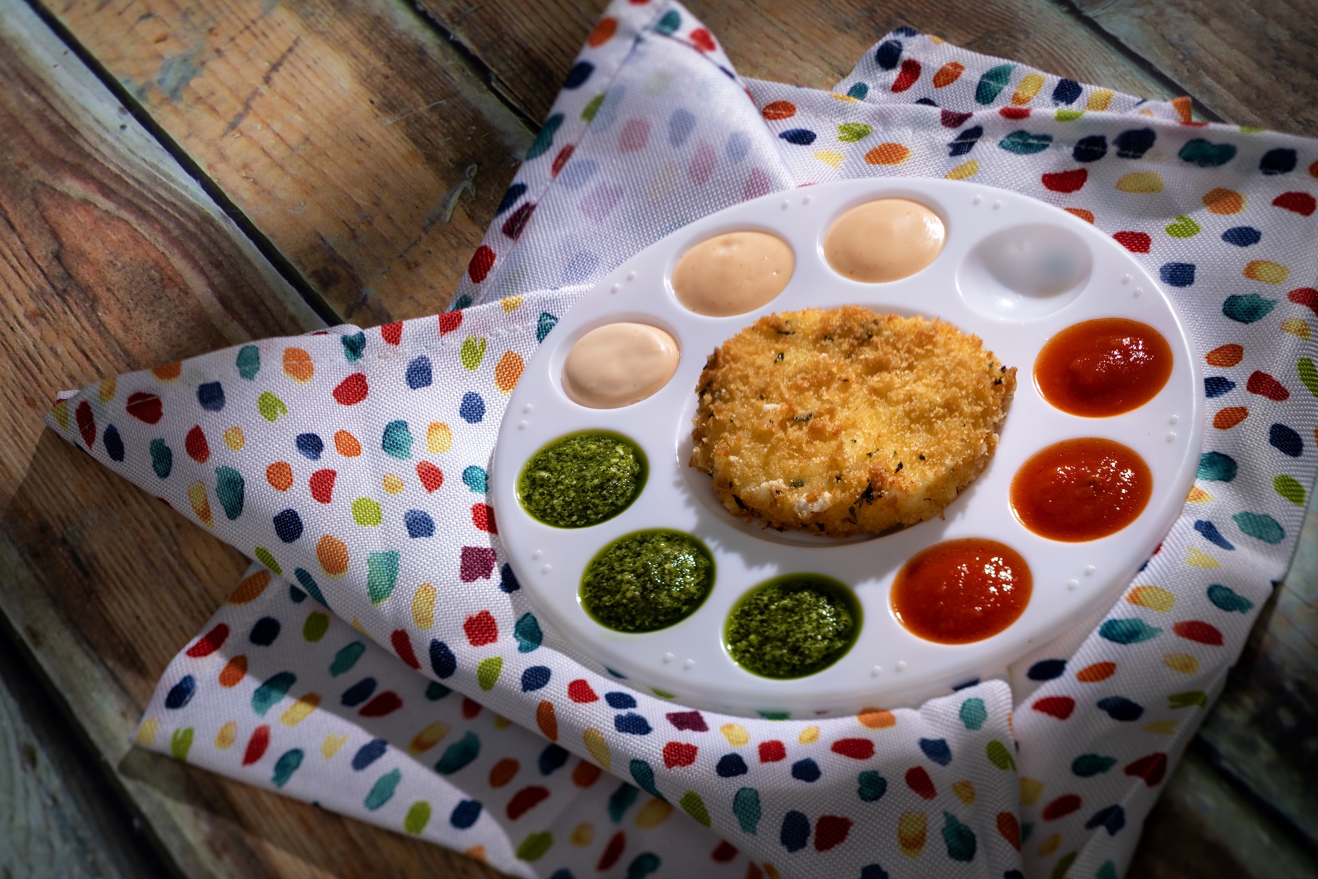 Mozzarella Fritta: Flash-fried breaded fresh mozzarella with artist palette condiments