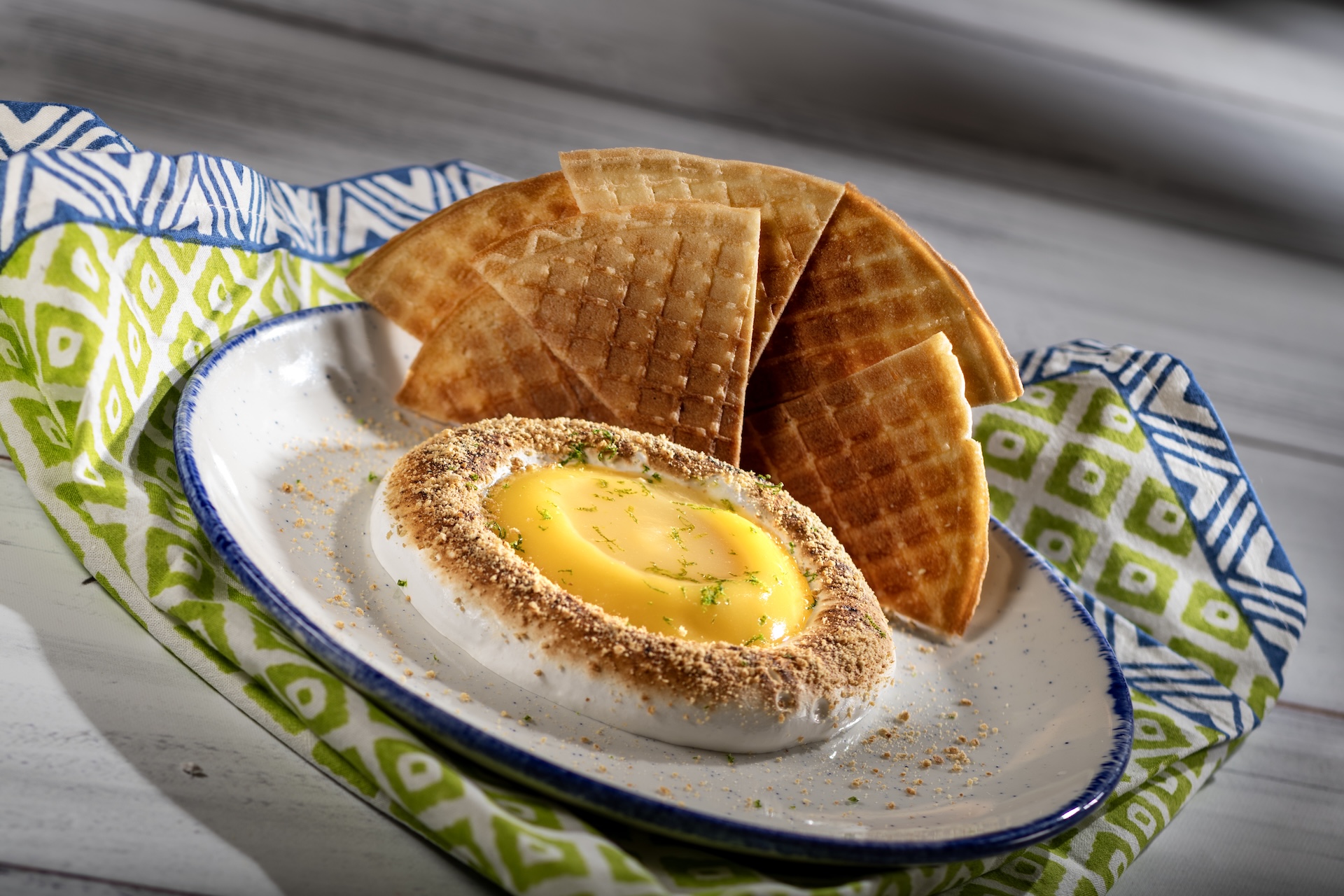 Deconstructed Key Lime Pie: Key lime curd, key lime gelée, toasted meringue, and graham cracker crumbs with waffle cone triangles (New)