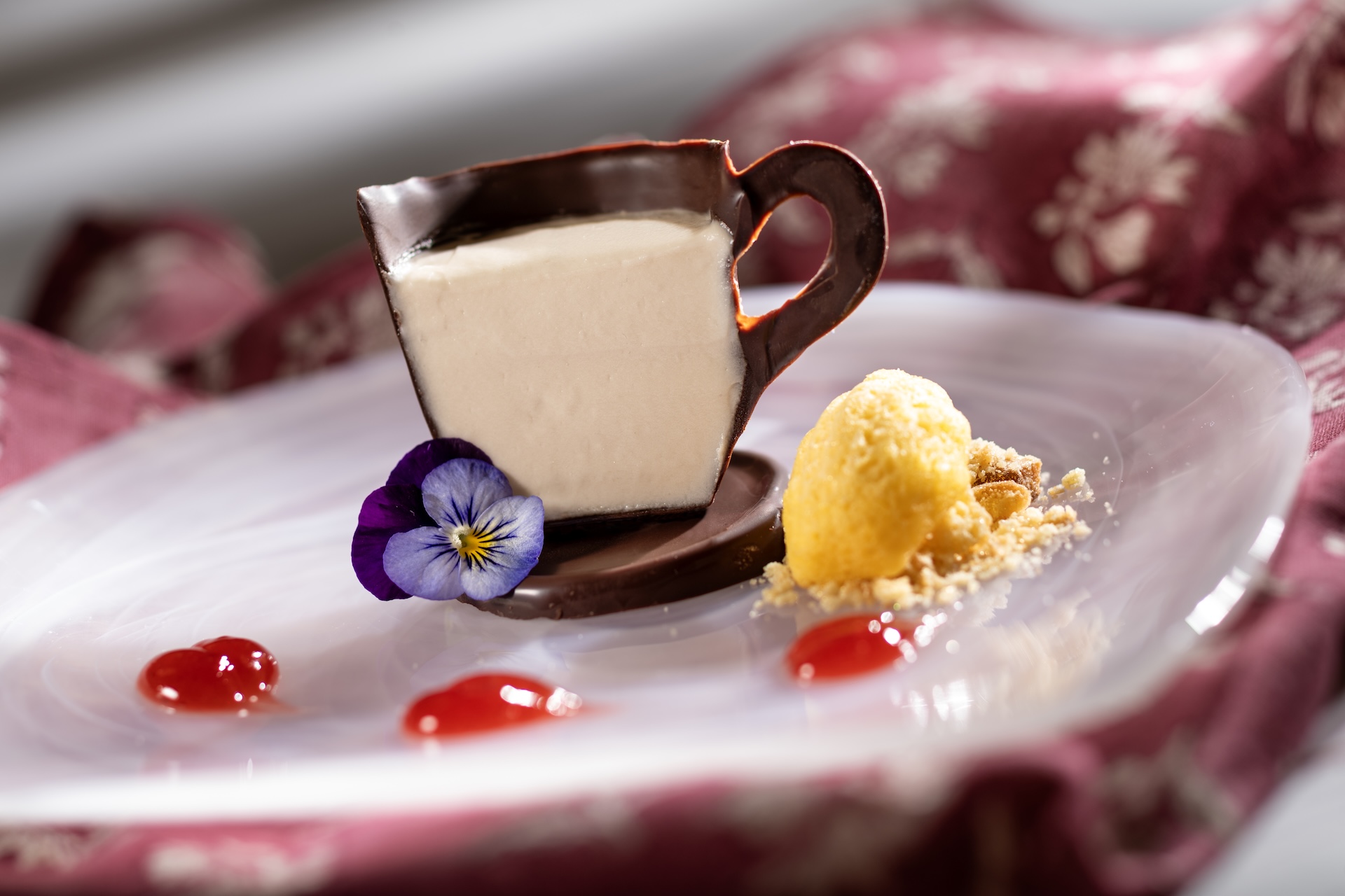 Chapter 3: Tea Treat: Twinings Earl Grey Tea Treat Chocolate Pot de Crème, lemon madeleine, rose and raspberry jam, and a tea biscuit crumble (New)